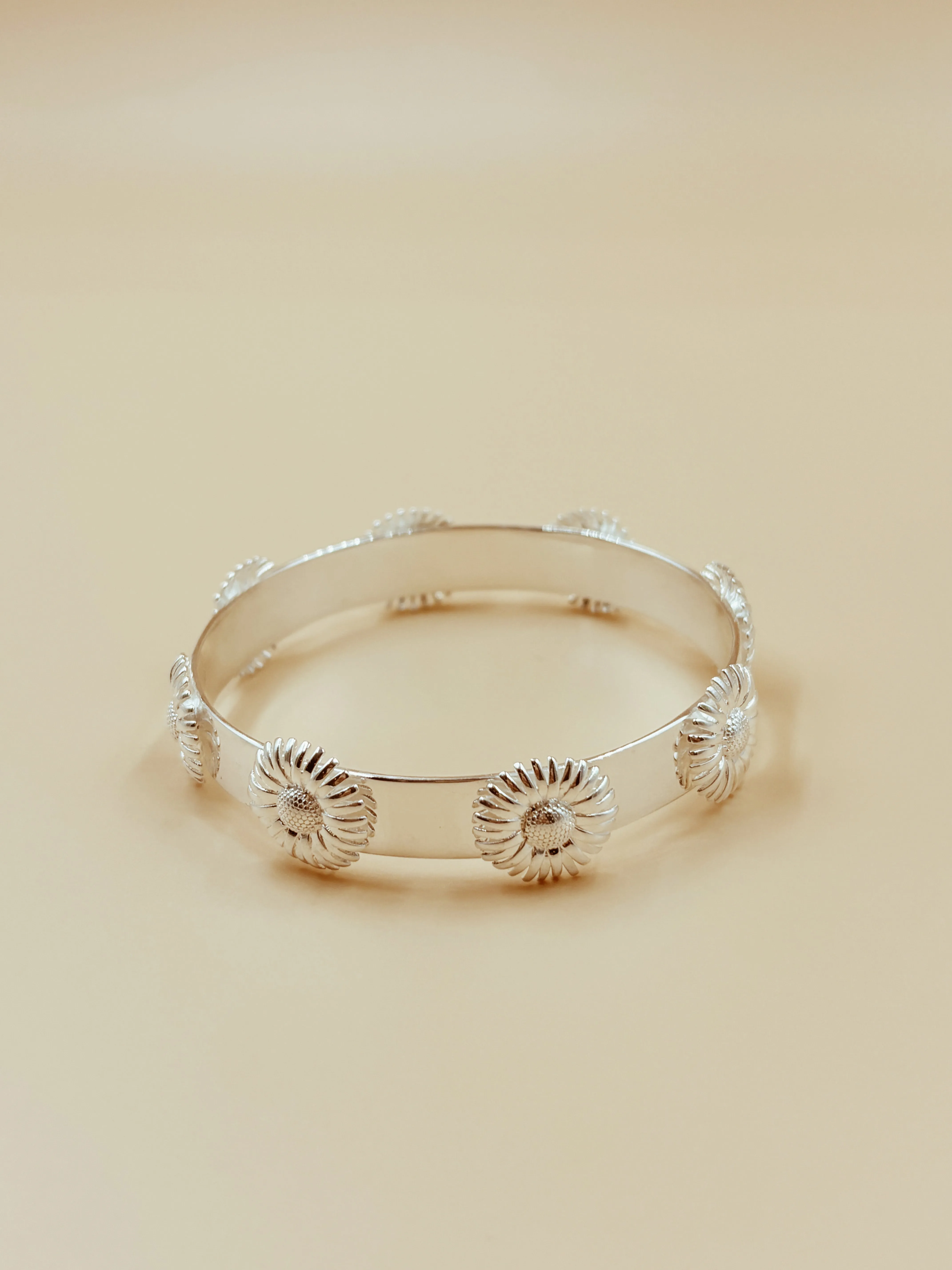 Enchanted Daisy Bangle in Silver Tone