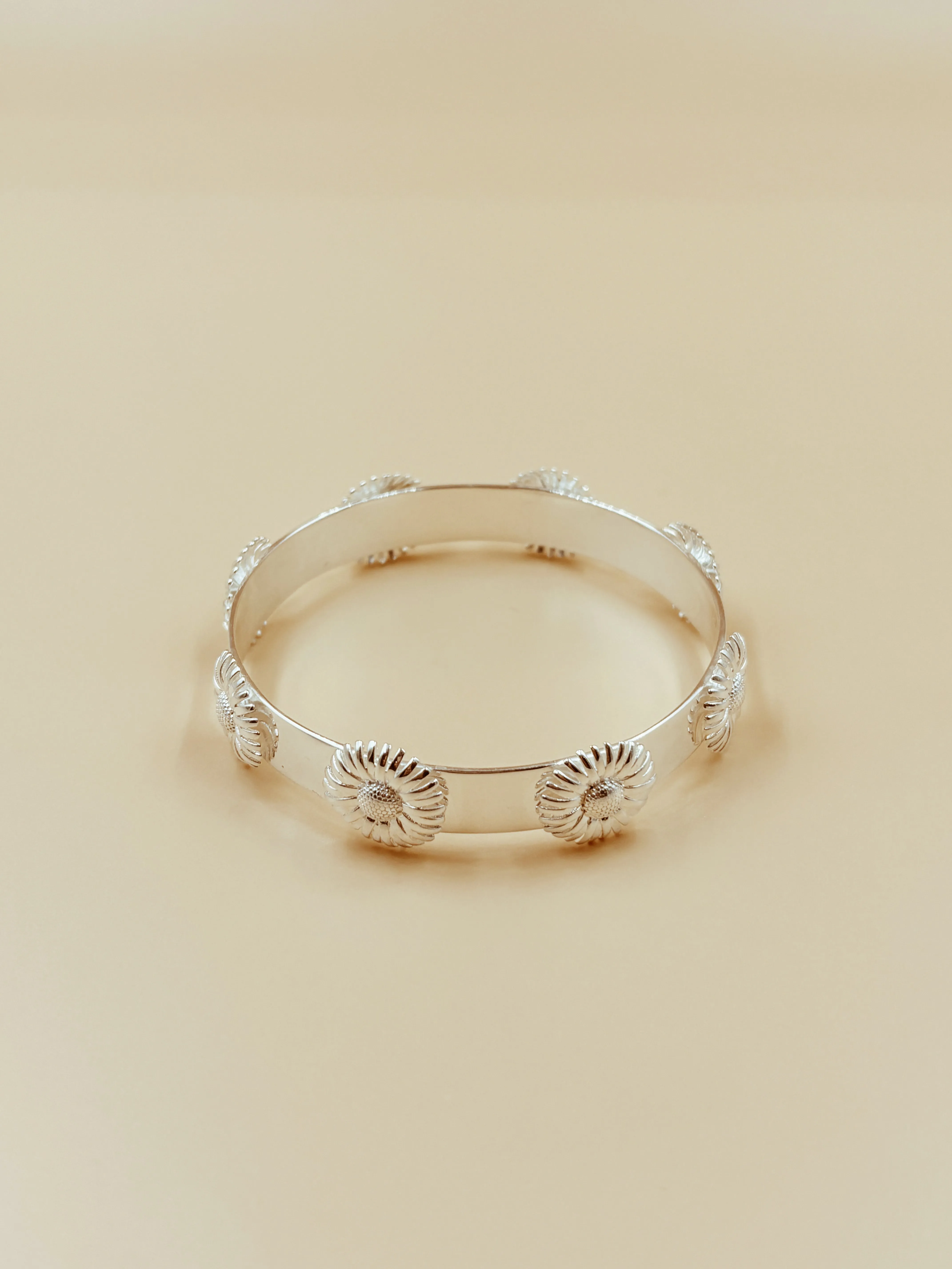 Enchanted Daisy Bangle in Silver Tone